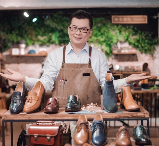 Small show business owner showcasing his products