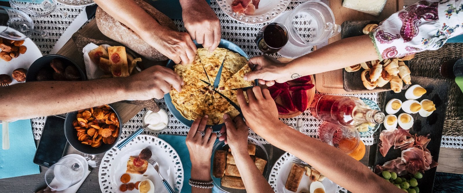Family and friends enjoying food